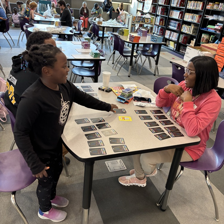 ROAR students playing games with their family