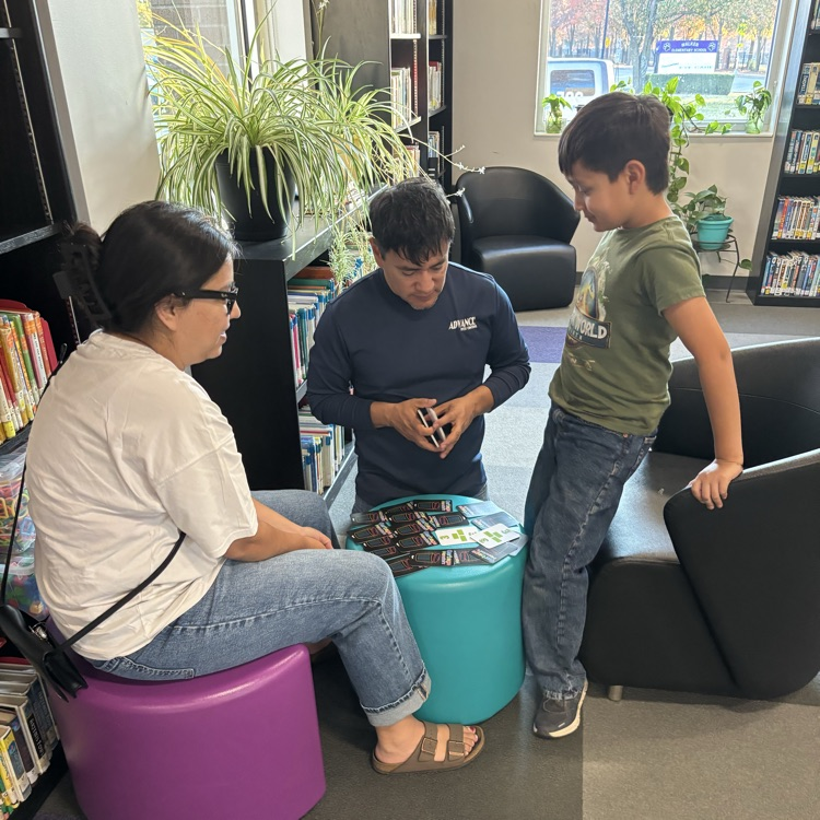 ROAR students playing games with their family