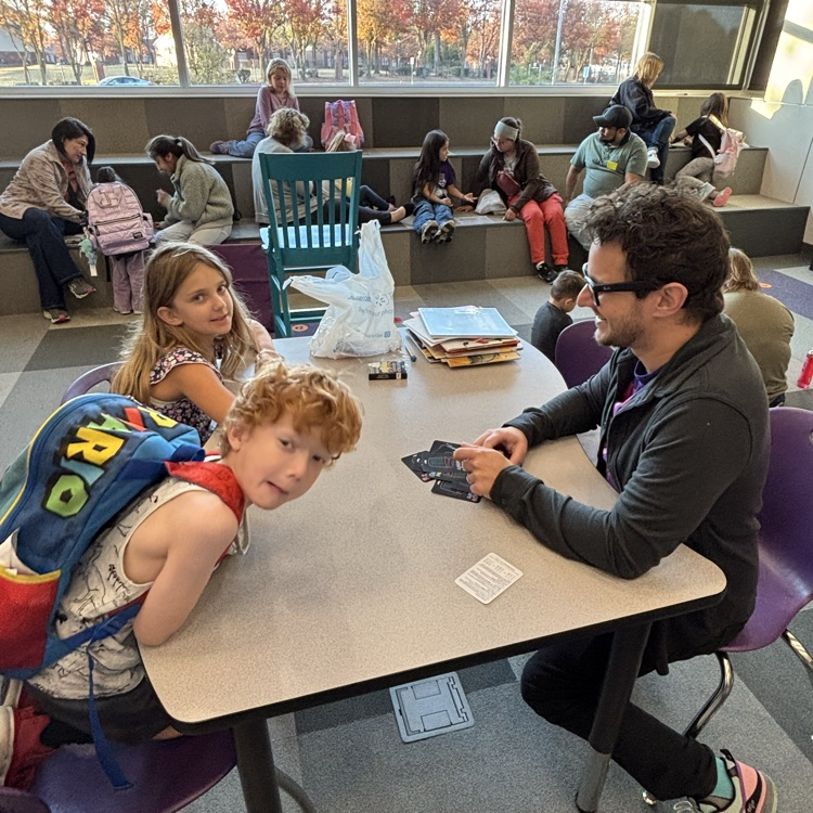 ROAR students playing games with their family