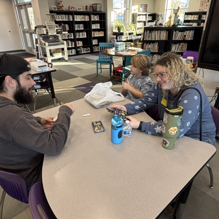 ROAR students playing games with their family