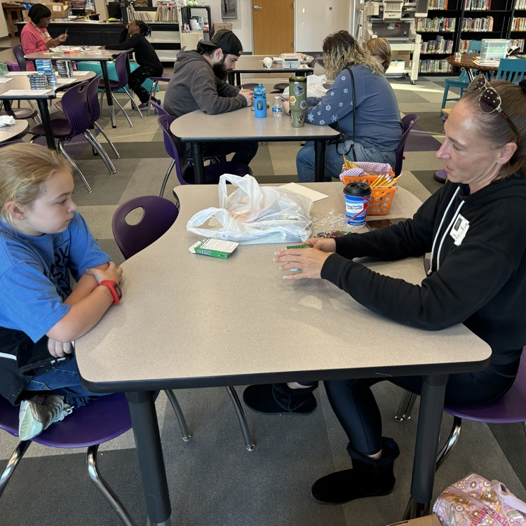 ROAR students playing games with their family