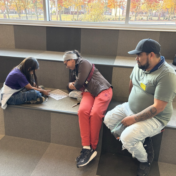 ROAR students playing games with their family