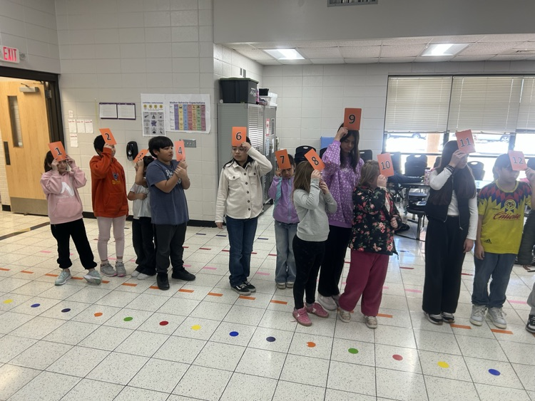 Students playing a number game