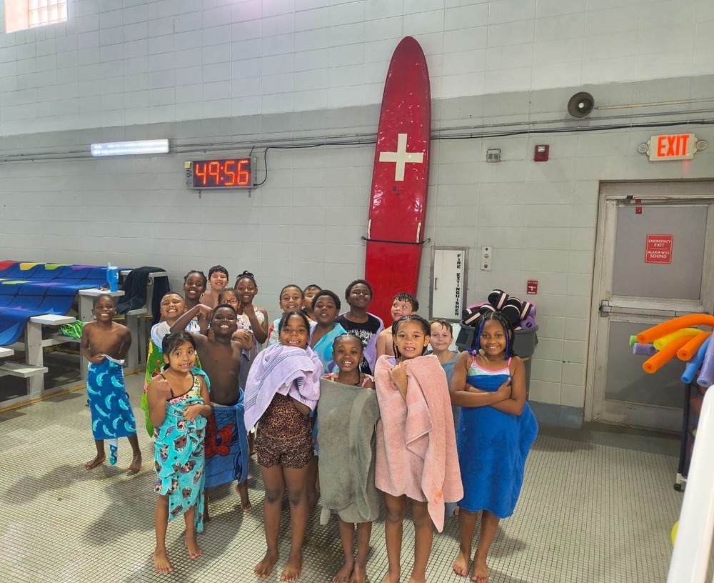 Lincoln Elementary students wade into the pool