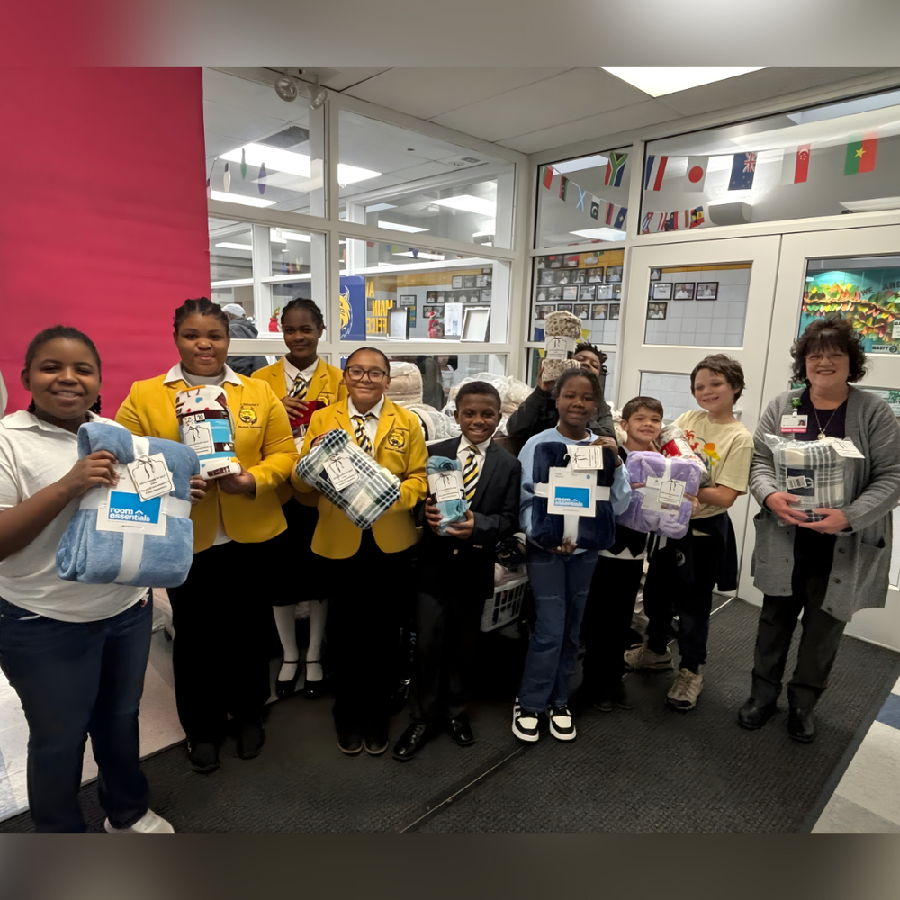 Fulton students hold their collected blankets