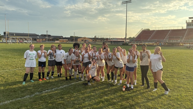 the wildcat girls soccer team all posing together after the game 