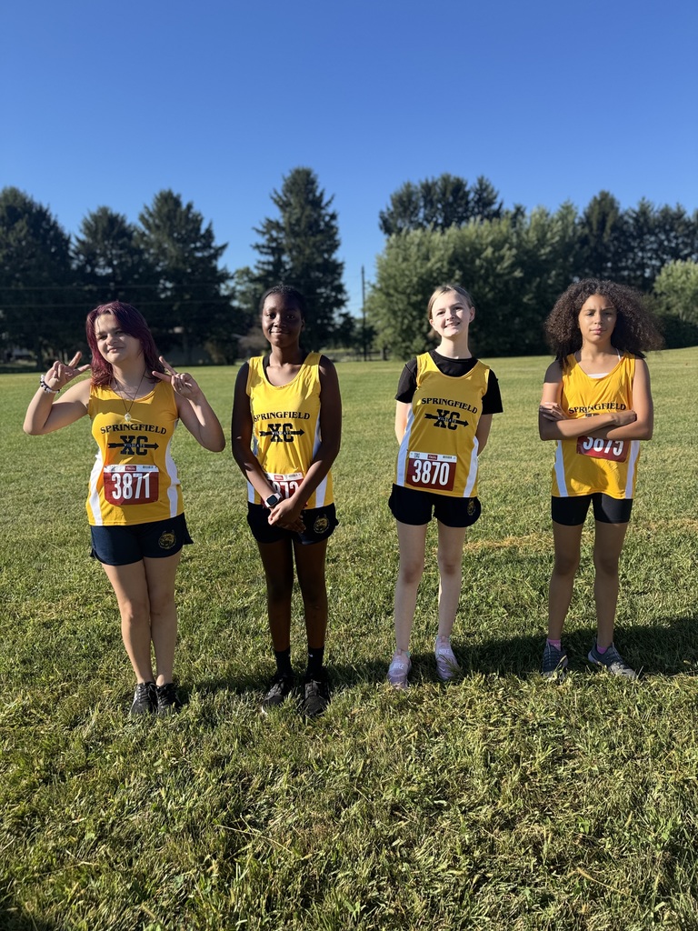 Four runners in uniform 