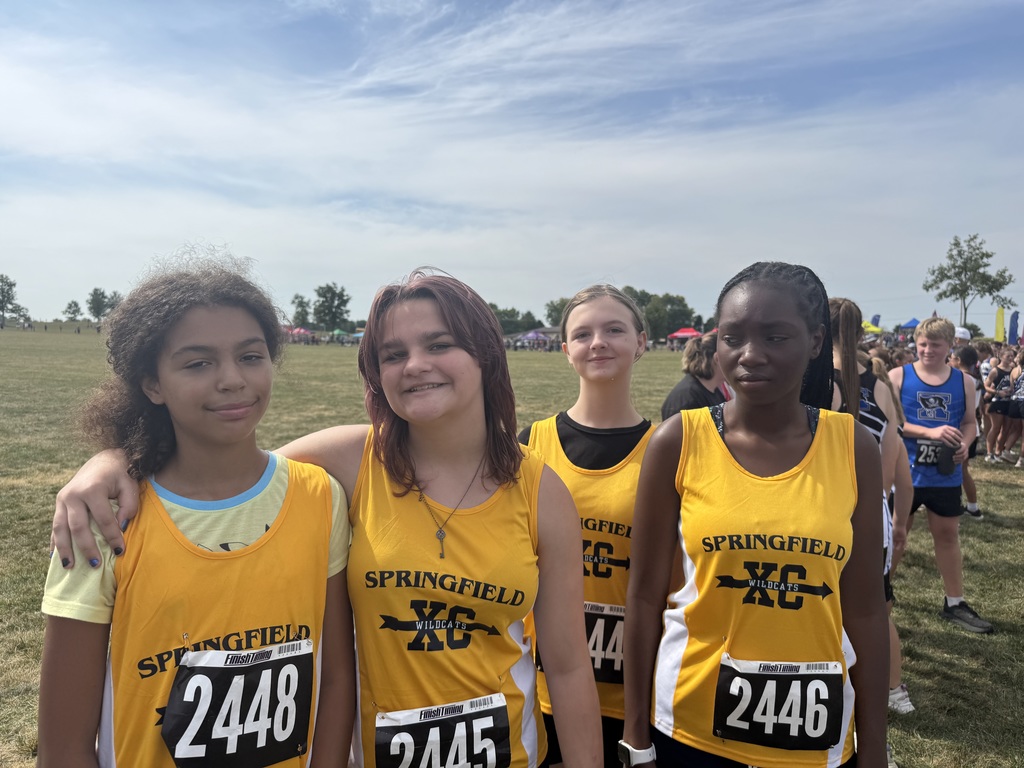 Four runners in uniform