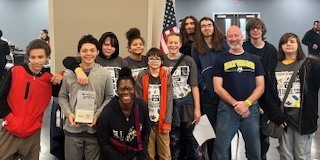 Extreme Bots Team with Mr. Kelly their coach.