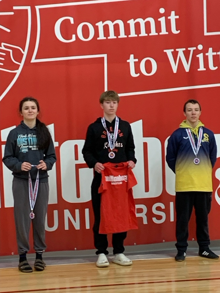 Anthany Gevedon poses with other placers