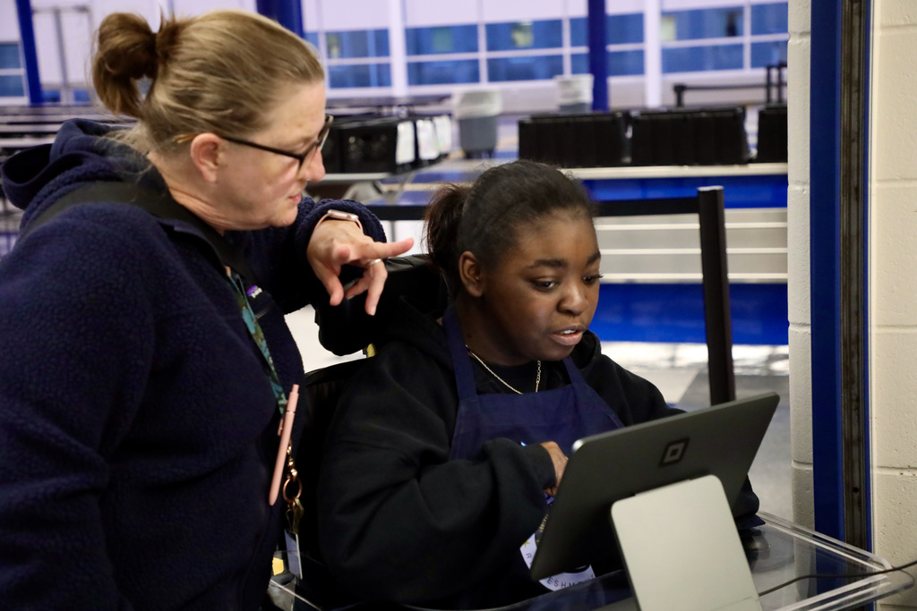 Young lady working the register