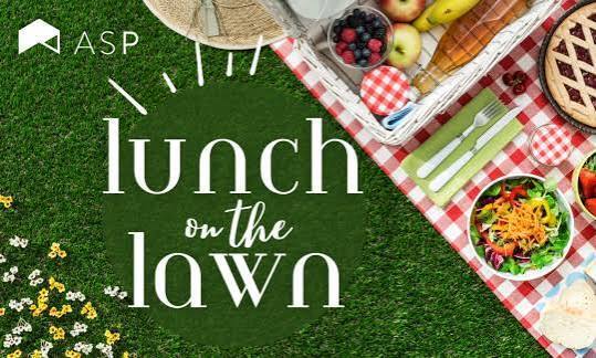 lunch on the lawn picture with grass, picnic blanket, and food