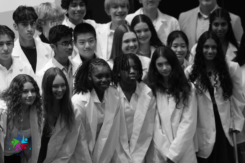 students in white coats