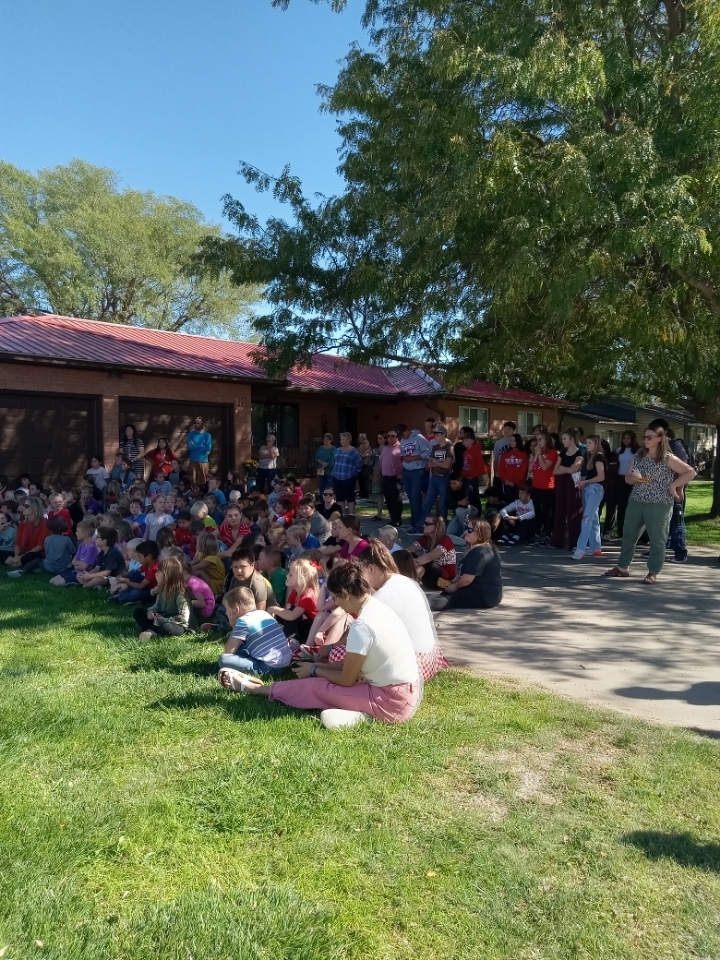 K-12th Students watching the Arbor Day celebration.