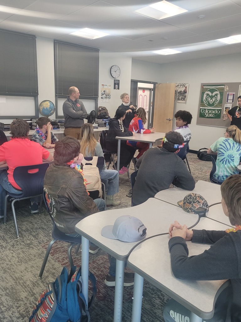 Picture of Debbie Kuroiwa presenting to a class of students