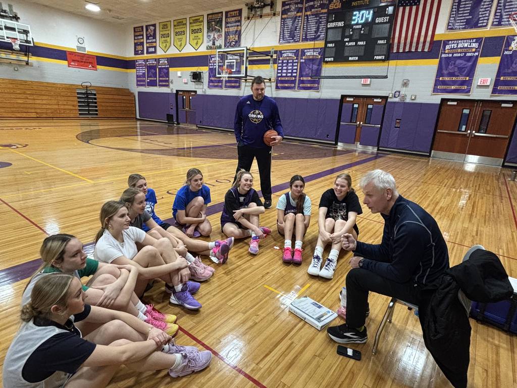 Coach Masters speaks to the girls basketball team.