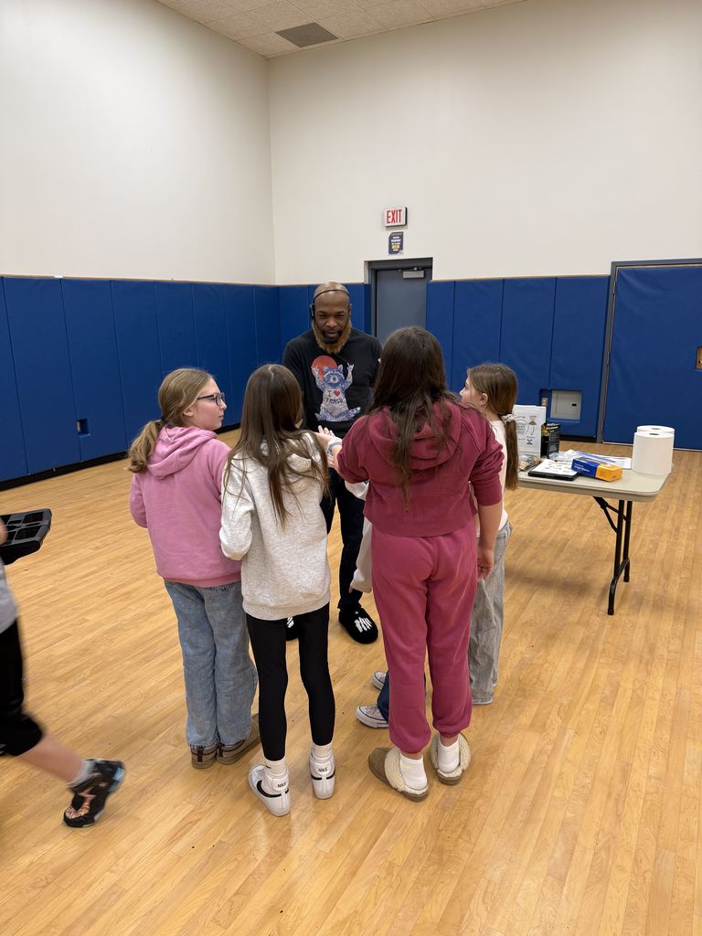 students speak to the owner of BFLO Worm Works