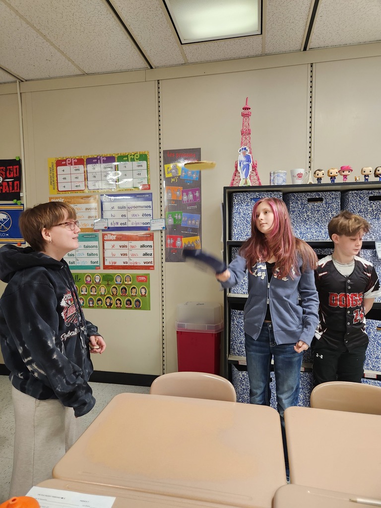 Students flip crepes.