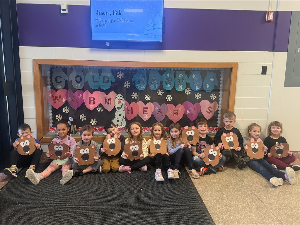 students with groundhog art