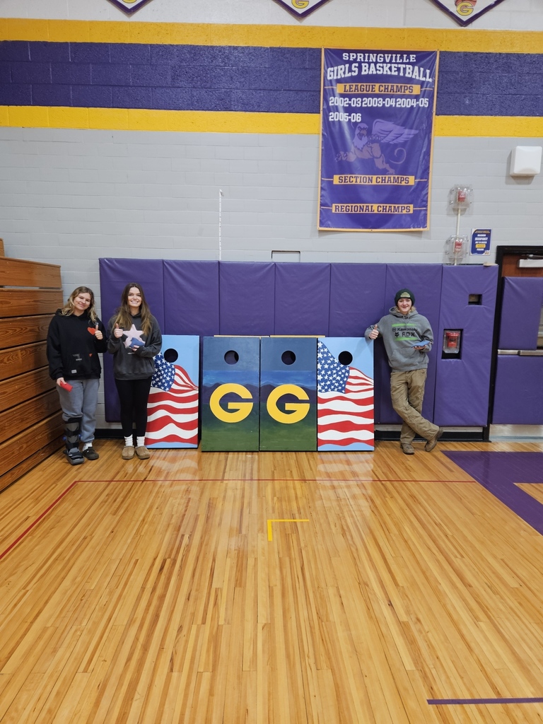 students with cornhole games.