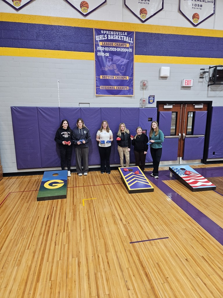 students with cornhole games.