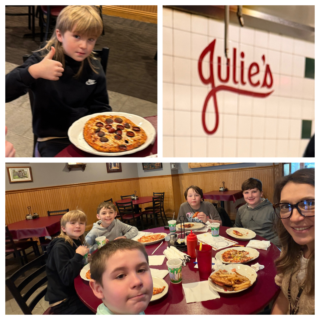 students eating pizza at Julie's