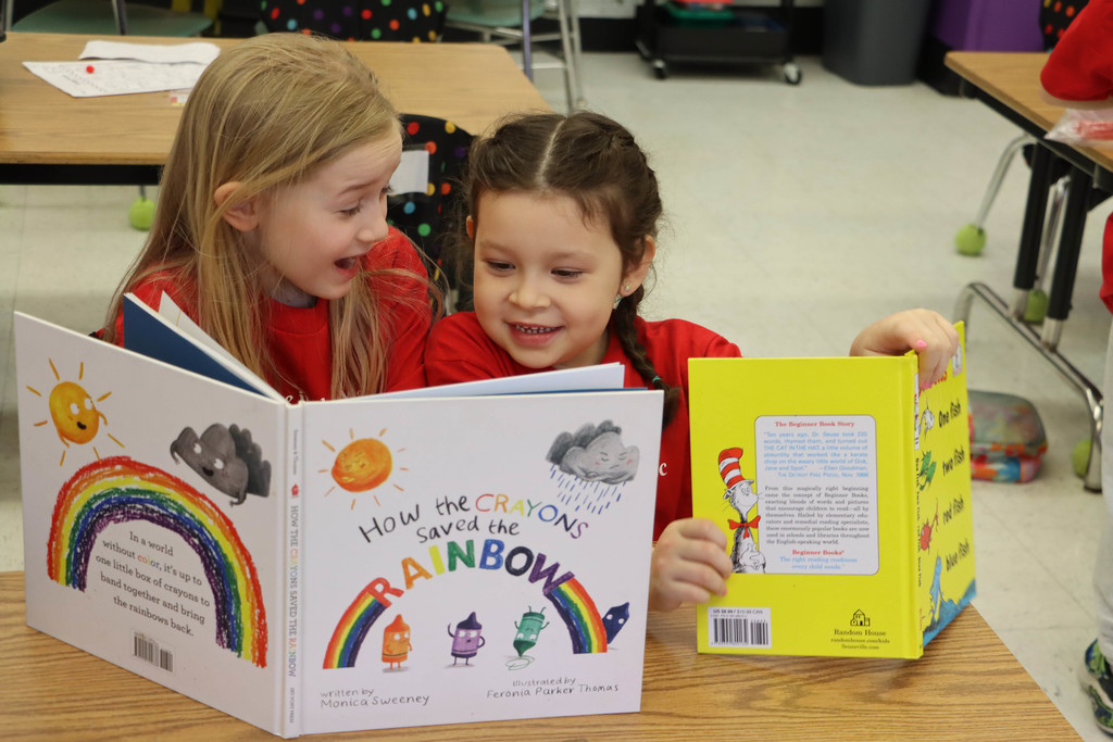 two students read books.