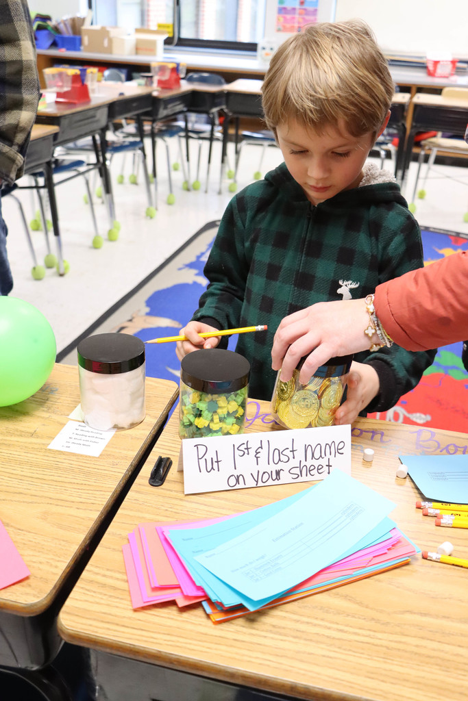 a student guesses the number of items in a jar. 