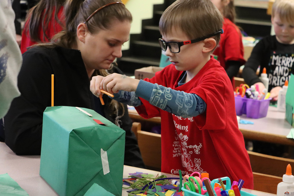a student makes a leprechaun trap. 