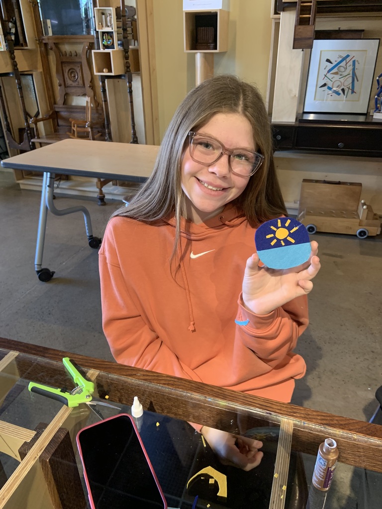 Student makes artwork. 