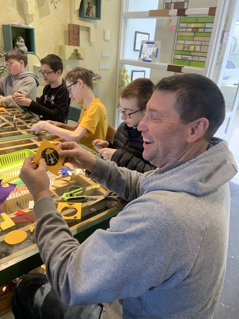 Students and Mr. Reese make artwork. 