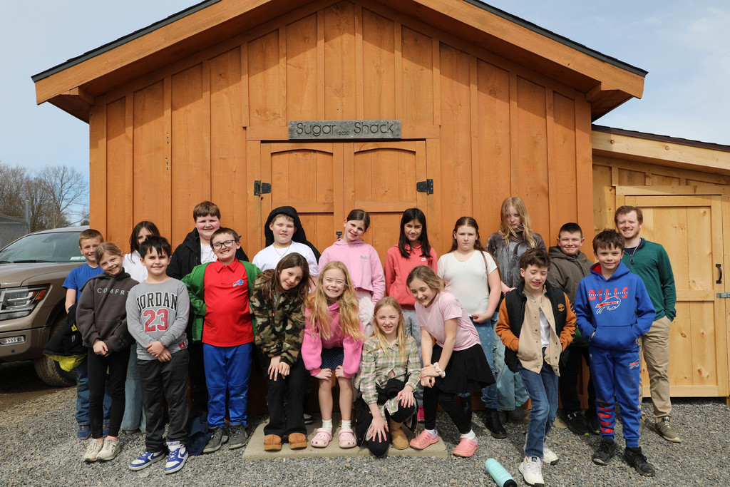 students outside the sugar shack