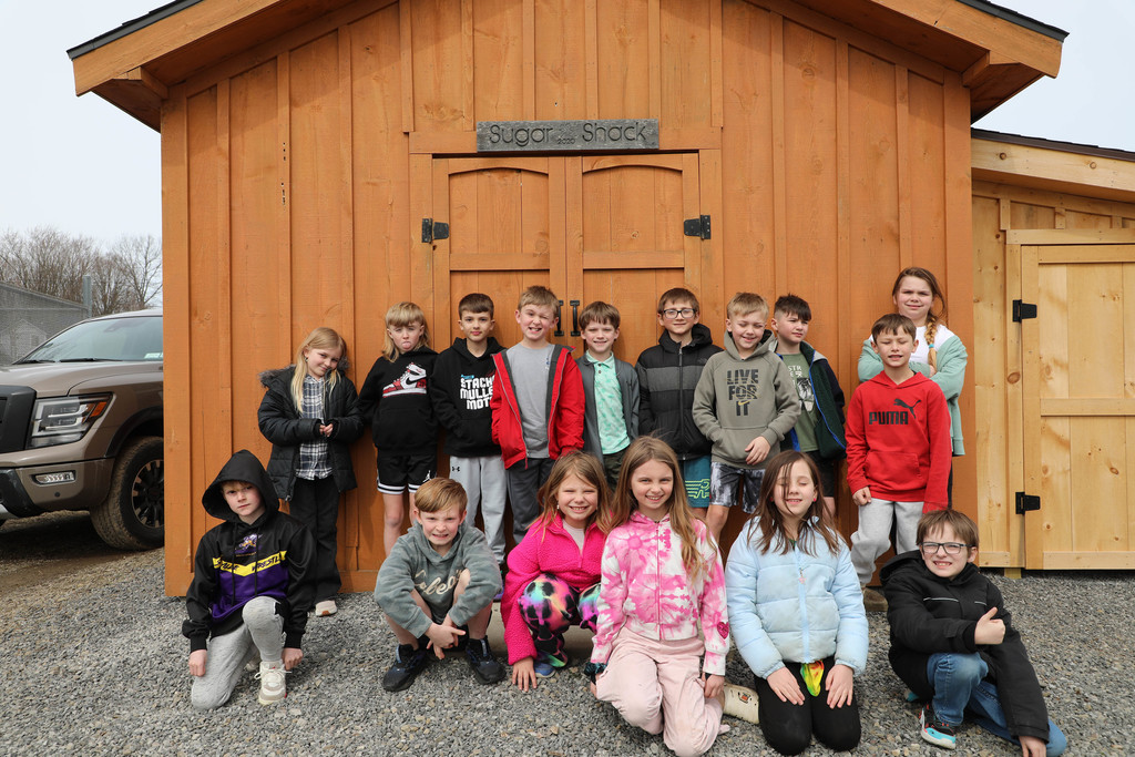 students outside the sugar shack