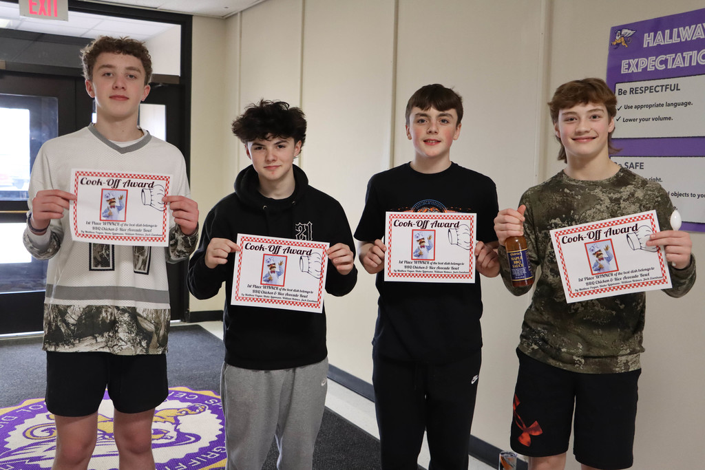 The winning team with their certificates