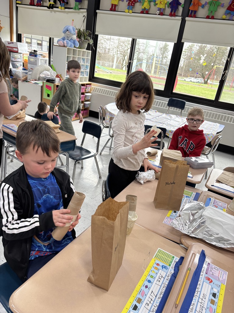 students work on their egg drop experiment