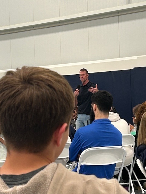 Student watches the guest speaker. 