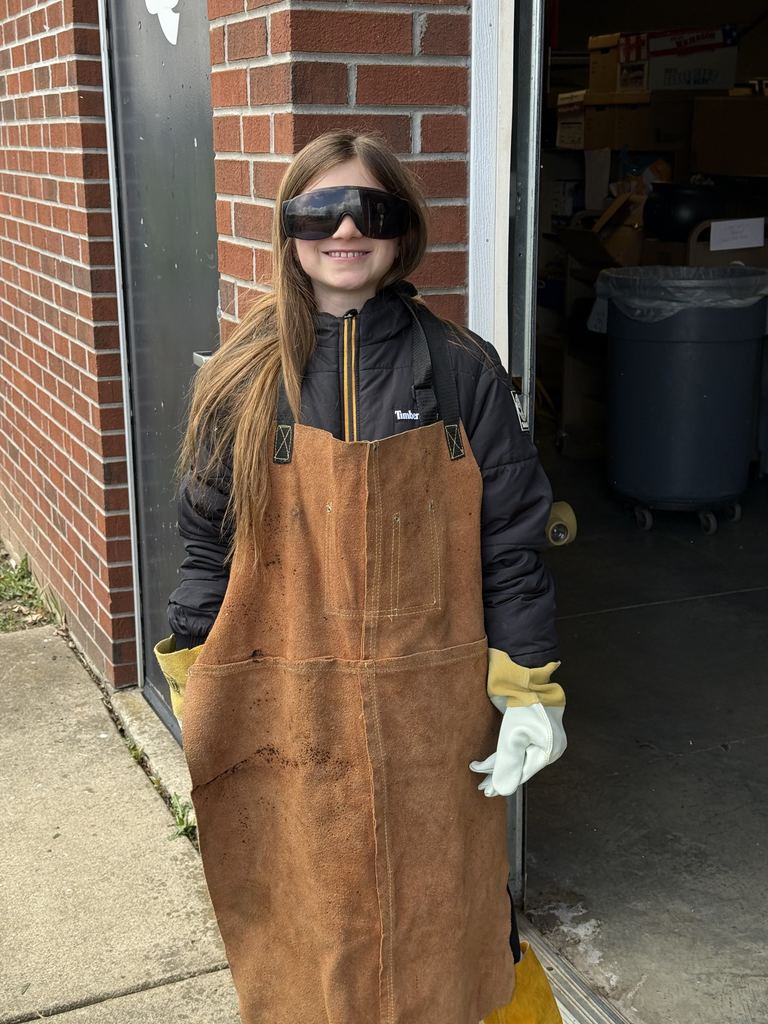 A student in protective gear. 