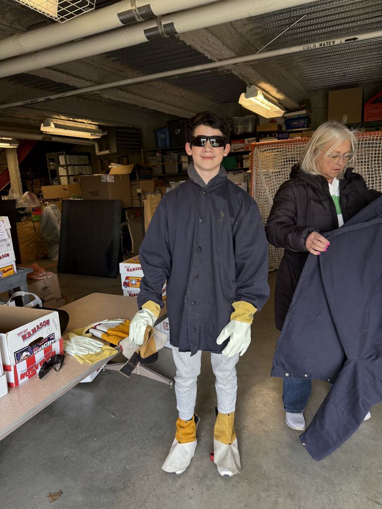 A student in protective gear. 