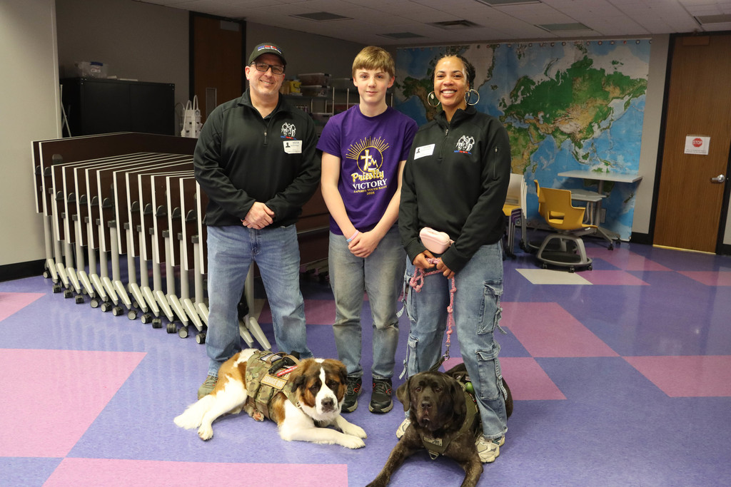 WNY Heroes, their dogs and a student.