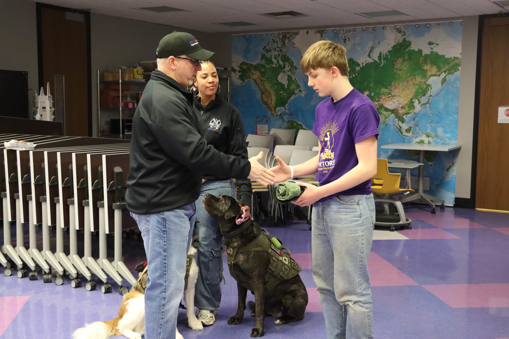 WNY Heroes with a student.