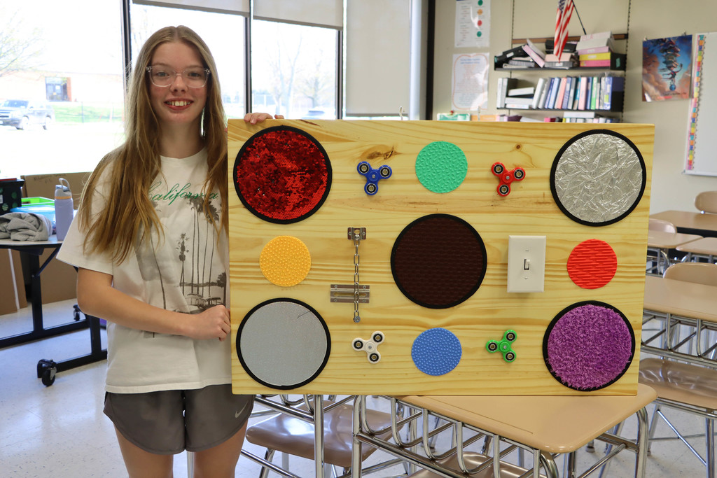 Lily and the sensory board.
