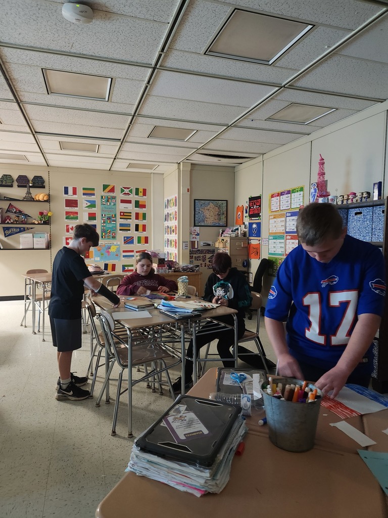 French students working on flags. 