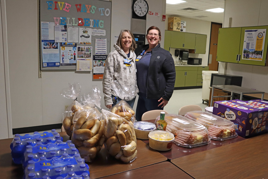 Walmart workers with the lunch spread.