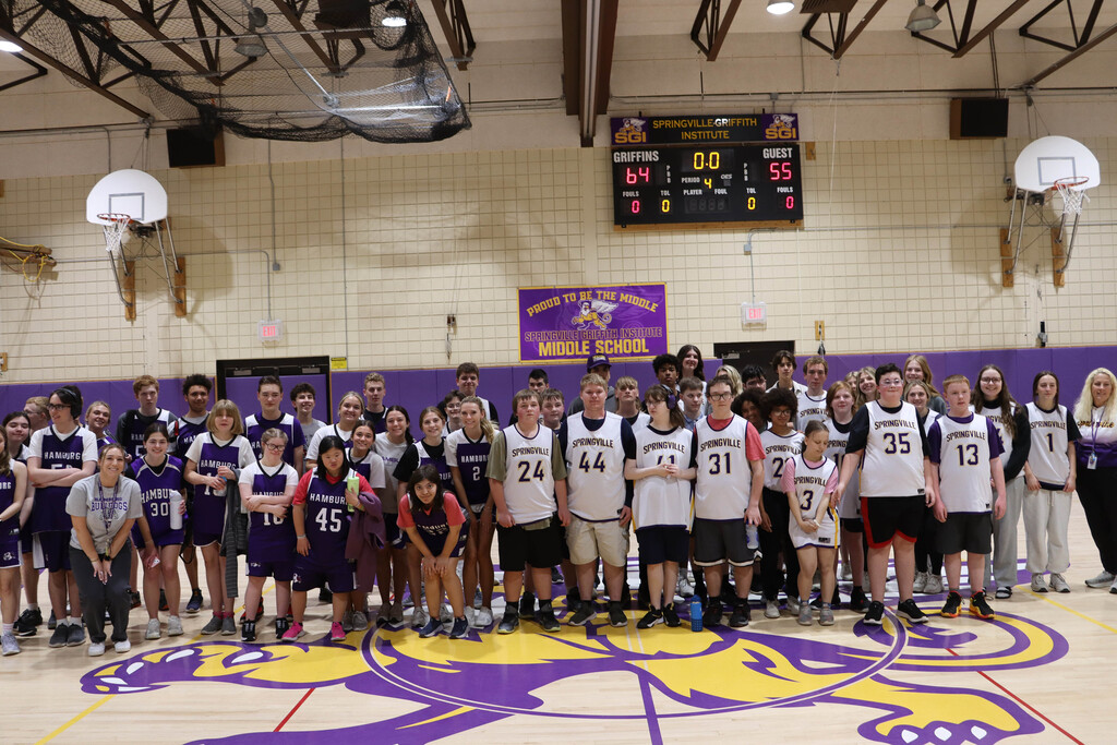group photo of both teams.