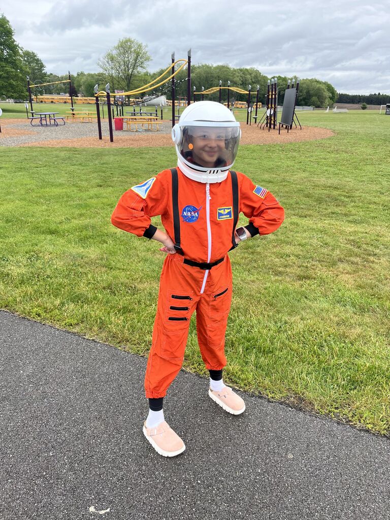 Student dressed as an astronaut. 