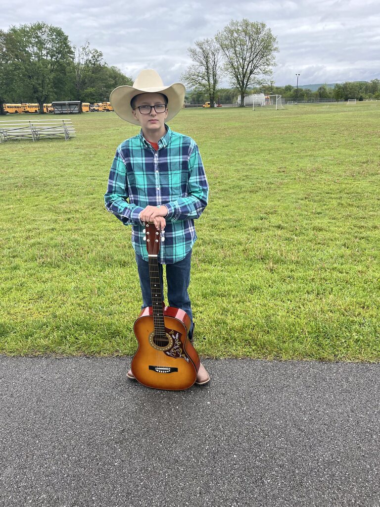 Student dressed as a country singer. 