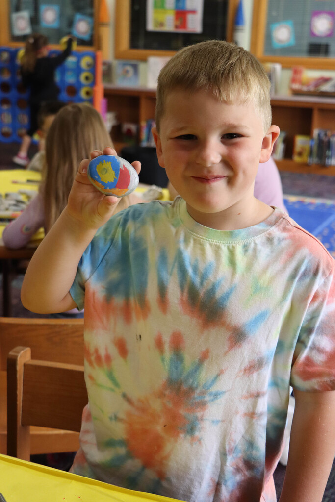 Painting rocks.