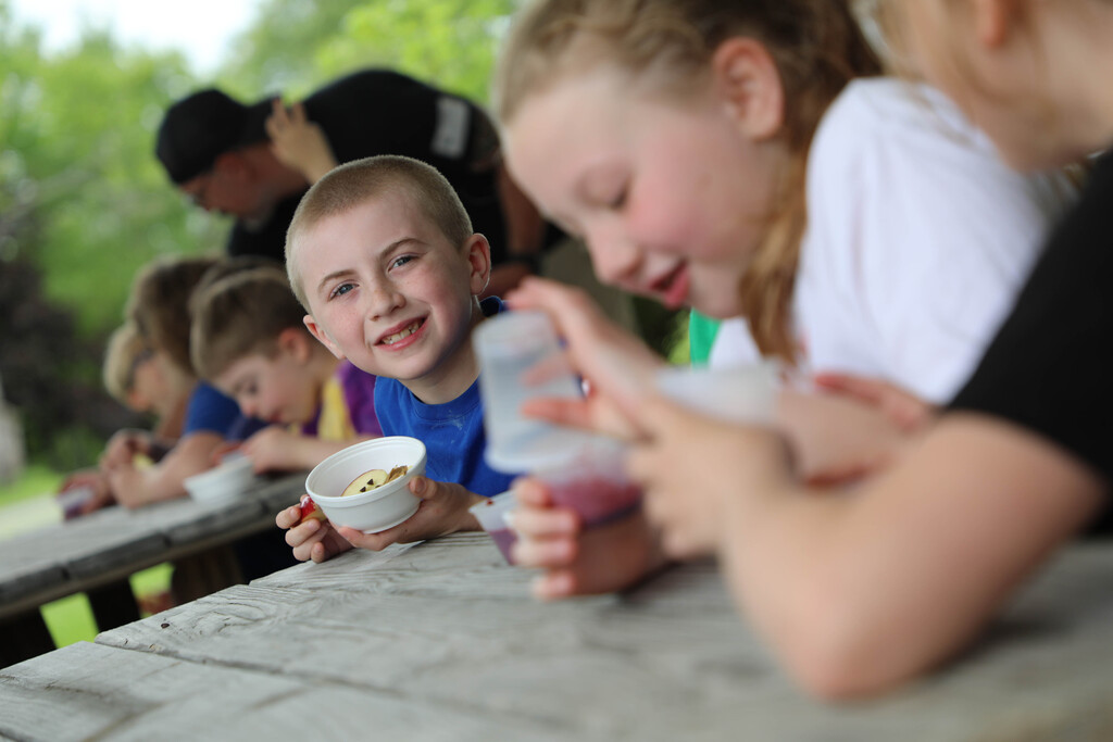 A student eats his trail mix.