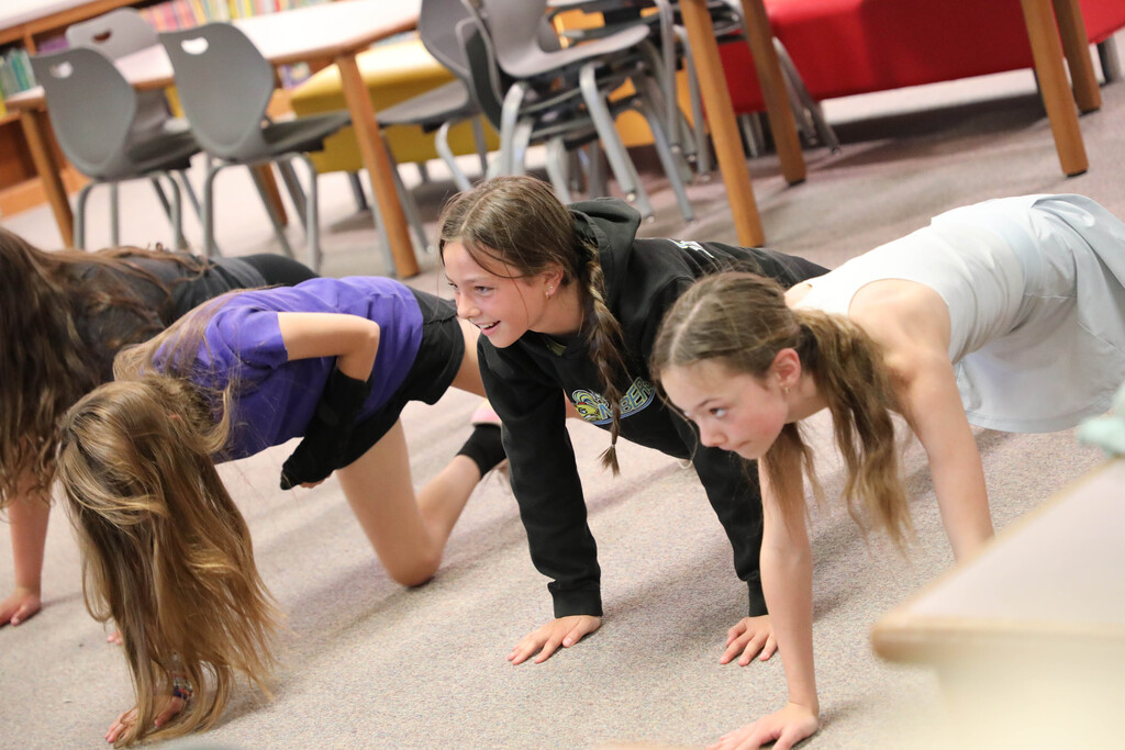 Students do planks. 