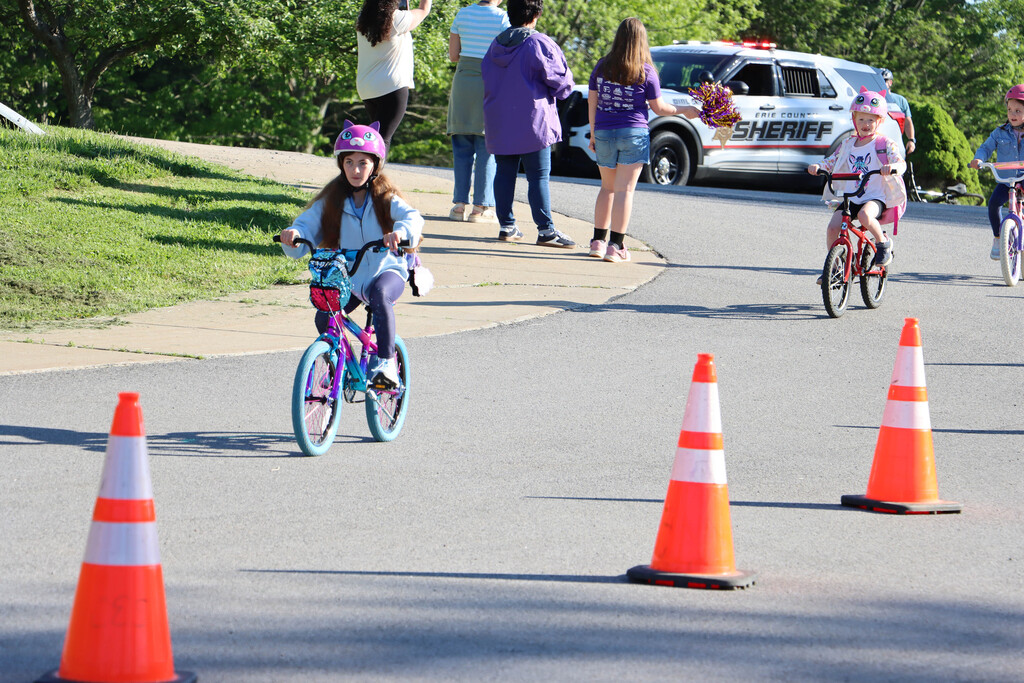 Students pull into the school for snacks. 